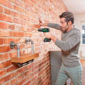 Акумуляторний дриль-шуруповерт Bosch UniversalDrill 18V (1x1,5 Ah) + ЗП AL 1810 CV